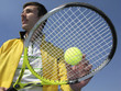 player in tennis on blue background sky iin sunny day