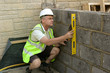 Foreman Checking the wall