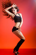 a young nice girl dancing modern dances