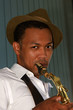 An youung and trendy African-American sax musician