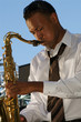 An youung and trendy African-American sax musician