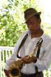An youung and trendy African-American sax musician