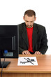 young businessman works at new office with pure white walls:)