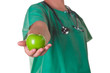 Doctor with a green apple on his hand