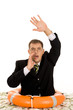 Portrait of crying businessman with buoy