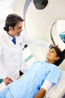 Foto: doctor and patient doing an mri scan doctor and patient doing an mri scan