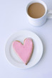 Heart biscuit and a cup of coffee