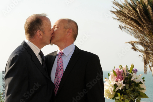 Photo: Gay Same Sex Male Couple Kissing in California Married Gay Same Sex Male Couple Kissing in California Married