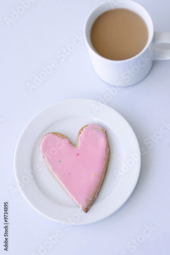 Photo: Heart biscuit and a cup of coffee Heart biscuit and a cup of coffee