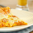 Photo: Hot pizza on the plate with cold beer Hot pizza on the plate with cold beer