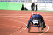 Image of disabled athletes competing in a wheel chair race.