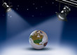 Earth between two spots of light on a dreamy background