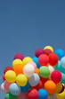 Countless colorful balloons flying in deep blue sky