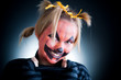 Smiling Jack-o-lantern girl isolated in studio