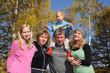 Happy family in autumn park