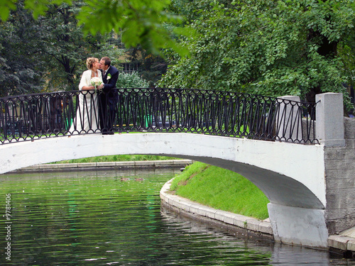 Photo: Beautiful bride in white with handsome groom on wedding Beautiful bride in white with handsome groom on wedding