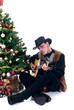 Photo en ligne au meilleur prix Christmastree with presents and cowboy playing on his guitar