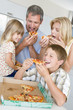 Family Eating Pizza Together