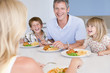 Photo: Family Eating A meal,mealtime Together Family Eating A meal,mealtime Together