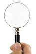 Photo: close-up of hand holding magnifying glass isolated on white close-up of hand holding magnifying glass isolated on white
