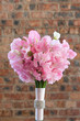 A colorful pink bridal bouquet of flowers