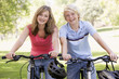 Teenage Boy And Girl On Bicycles