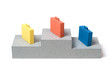 Three portfolios on a pedestal.