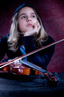 girl and a violin portrait, dark background