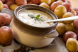 Creamy potato soup garnished with mint leaves Creamy potato soup garnished with mint leaves