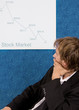 Stock broker analizing stock chart
