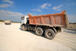 mining truck on blue on  background of  blue sky in career