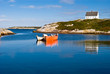 Fisherman's house and boats in a bay. Peggy's cove, Canada.