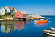 Photo: Fisherman's house and boats in a bay. Peggy's cove, Canada. Fisherman's house and boats in a bay. Peggy's cove, Canada.