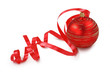 Red christmas ball with a curly ribbon