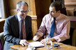 Foto: Signing a contract in a cafe Signing a contract in a cafe