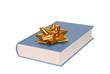 Book with golden bow isolated on white