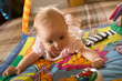 Little baby play in developmental toy Little baby play in developmental toy