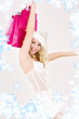 picture of cheerful santa helper girl with shopping bags