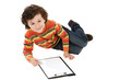 Beautiful child lying down painting on a over white background Beautiful child lying down painting on a over white background