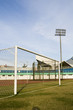 Soccer goalpost in empty football stadium