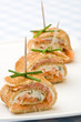 Fresh salmon and cream cheese canapes with chives