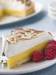 Slice Of Lemon Meringue Pie With Raspberries