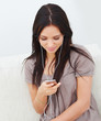 Woman  listening to music on Ipod or mp3 player