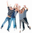 Excited young students jumping for joy