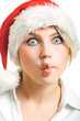 Mrs. Santa Claus making fish lips.