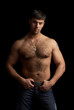 portrait of a strong muscular man, isolated on black portrait of a strong muscular man, isolated on black