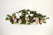Swag made of dried and silk flowers.