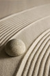 Stone on raked sand
