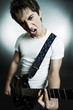 emotional singer with guitar over grey background