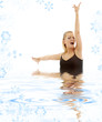 picture of blonde girl singing in water
